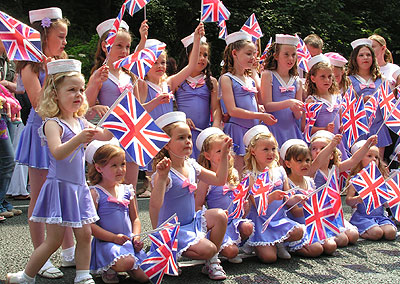 patriotic dancers waving union flags