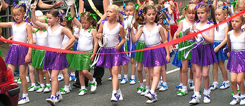 Purple tambourine dancers