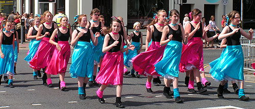 carnival dancers performing footloose