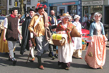 Family with relatives from Scotland in the parade