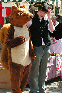 Large squirrel with georgian costume lad