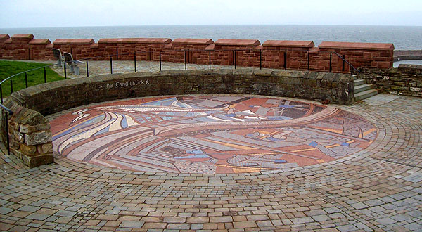 cicular mosaic near candlestick)