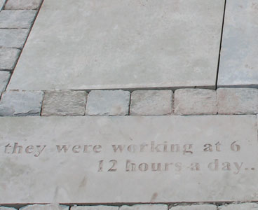 inscription in floor slab