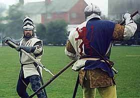 Two knights duelling with pikes