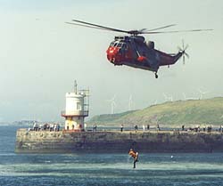 Helicopter rescues lifeboat man from harbour