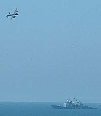 Lancaster over USS Leyte Gulf