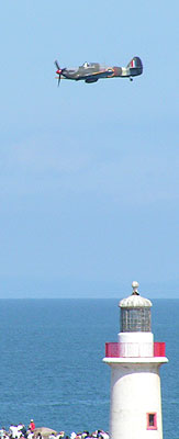 Hurricane flies over West Pier lighthouse