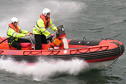 Police crashing through the waves