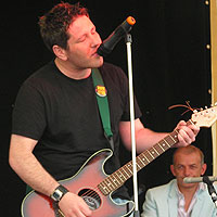Guitarist singing his song
