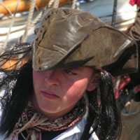 young pirate in leather hat