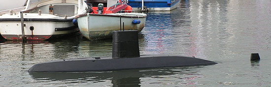 Scale model of nuclear submarine in the marina