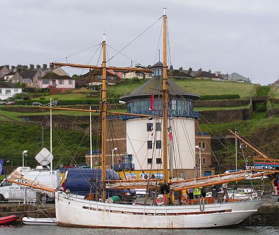 Tall ship Vilma in front of Whitehaven Beacon