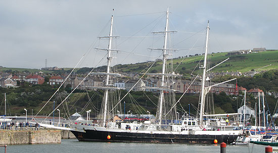 Tight turn as tall ship Lord Nelson exits Whitehaven Harbour