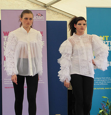 Two white blouses with frilled sleeves