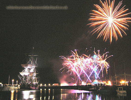tall ship endeavour at night with firework display