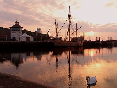 sunset setting behind the Matthew in Whitehaven