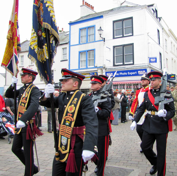 Flag bearers in Whitehaven market place