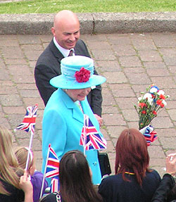 Queen collects flowers