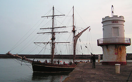 Tall ship Zebu passing the North Pier Lighthouse