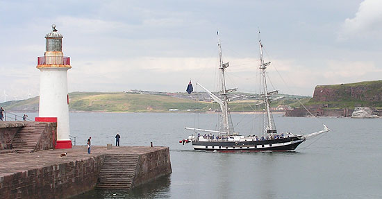 T.S. Royalist sails past Whitehaven lighthouse