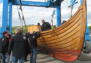 Chests loaded onto boat