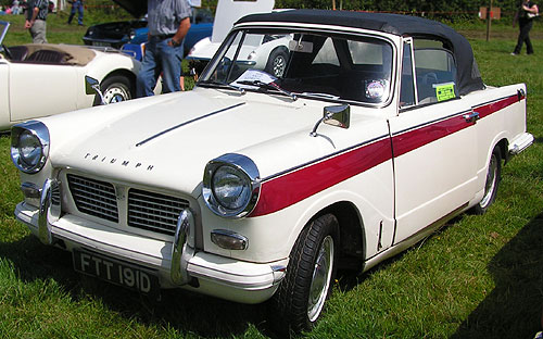 1966 Triumph herald convetible white with red stripe